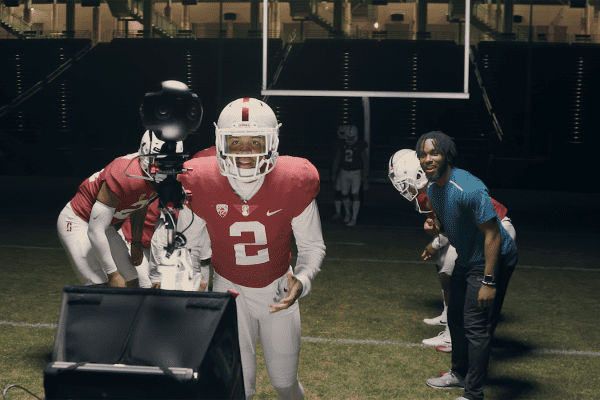 Photo of Brandon Simmons delivering line to 360 Camera in Stanford Stadium
