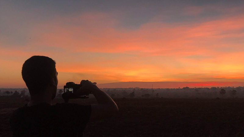Tomo filming the sunset